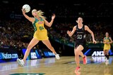 In control ... Australia's Gretel Tippett leaps for the ball against New Zealand
