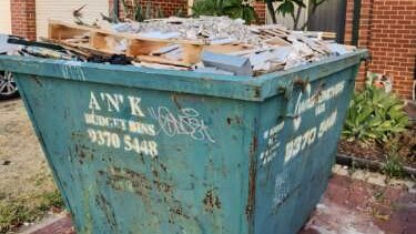 Nicole's skip bin left uncollected outside her house for months
