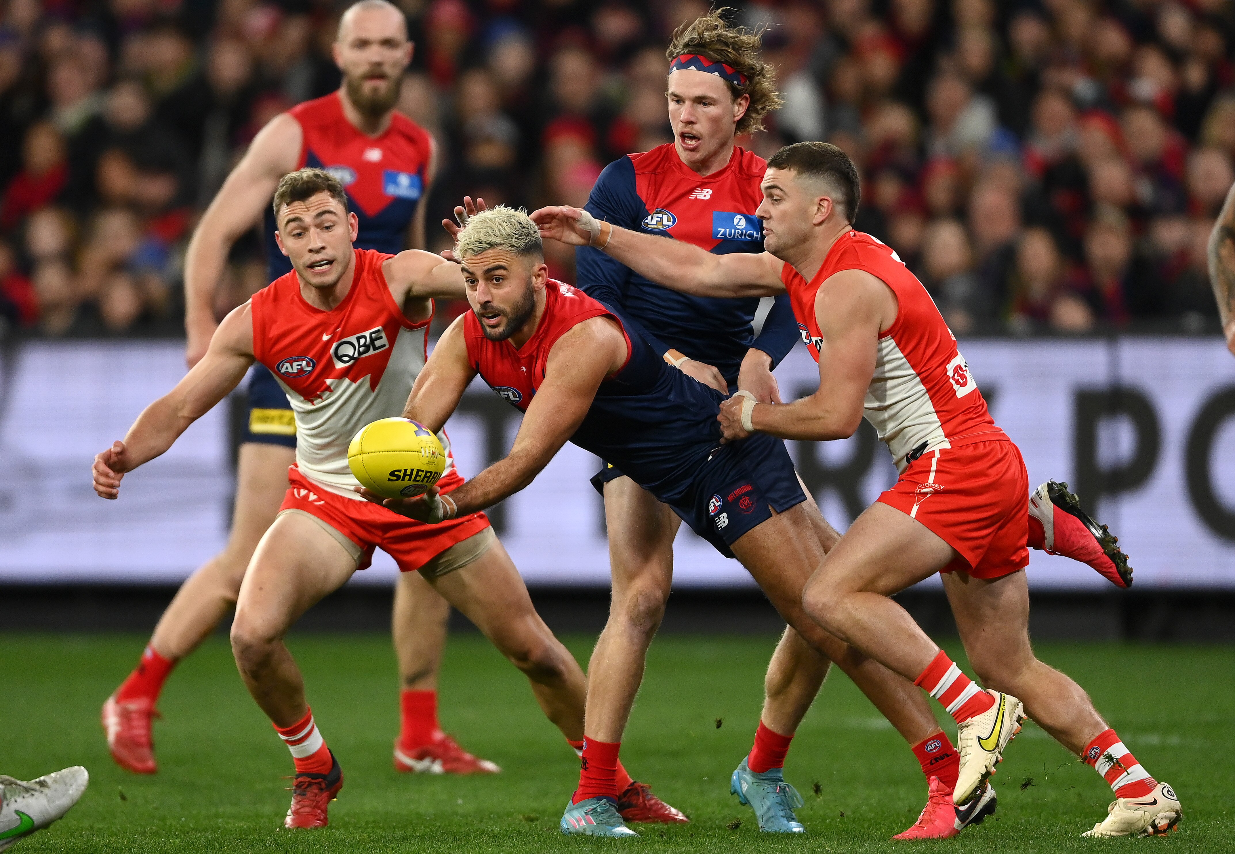 Chrisian Salem handballs under pressure