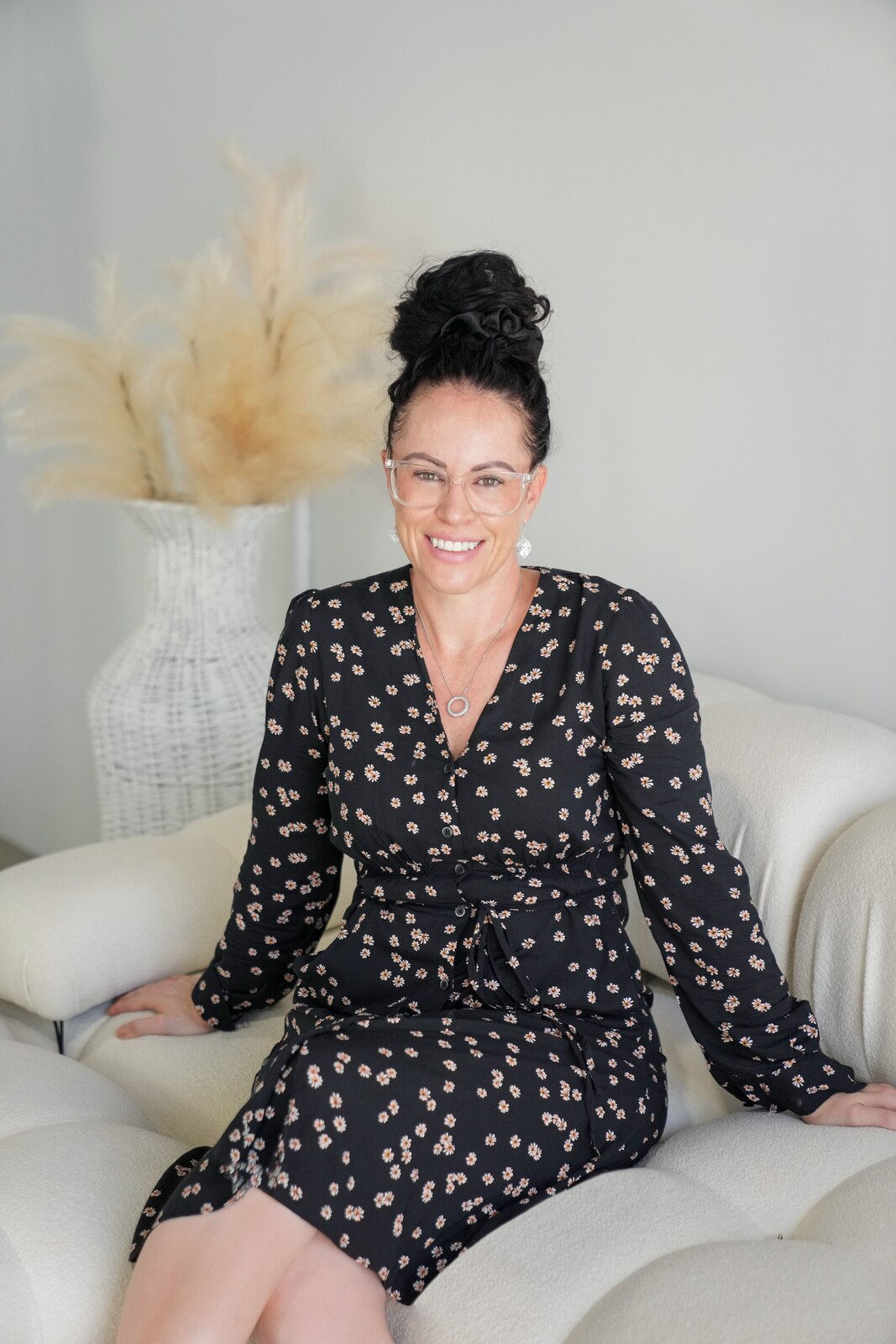 Marissa sitting on a couch