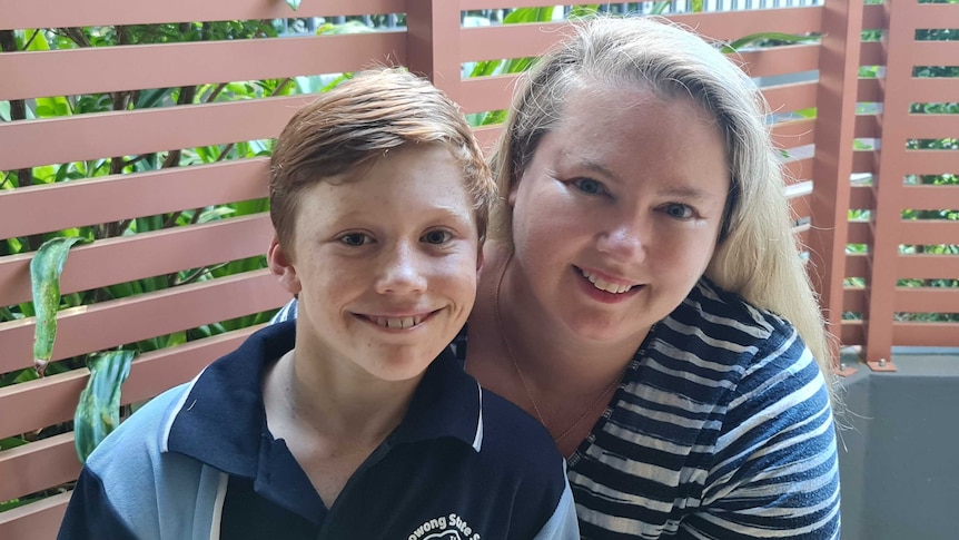 Elizabeth Ellis with son Murray smiling at the camera.