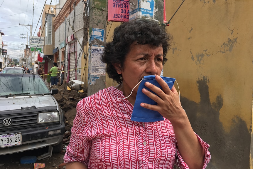 Rosa Bahena surveys the quake damage in Jojutla