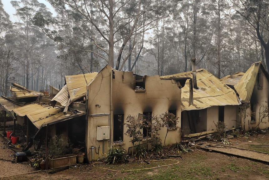 Burnt out shell of a house.