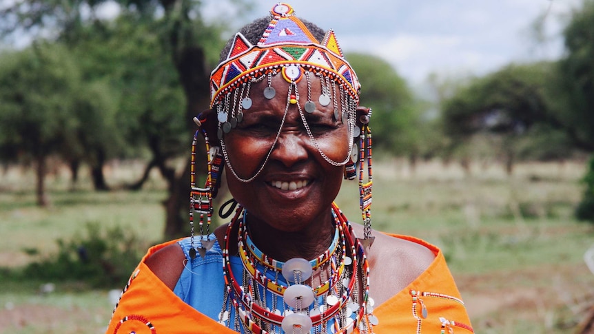 Kenyan midwife Salune Laton Koikai wearing her colourful traditional garments.