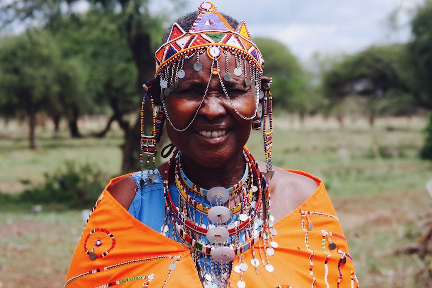 Kenyan midwife Salune Laton Koikai wearing her colourful traditional garments.