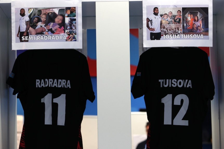 Semi Radradra and Josua Tuisova's shirts with pictures of their families above them