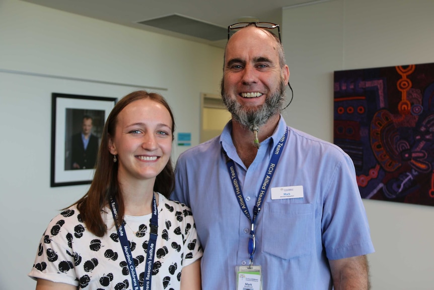 Poppy Lange pictured with her physiotherapist Mark Bradford.