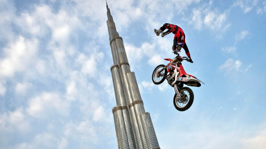 Josh Sheehan performs a stunt in front of Burj al Khalifa.