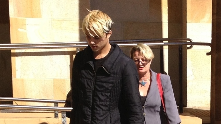 French outside court with his lawyer