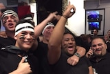 All Blacks fans celebrate after the All Black's 2015 Rugby World Cup win
