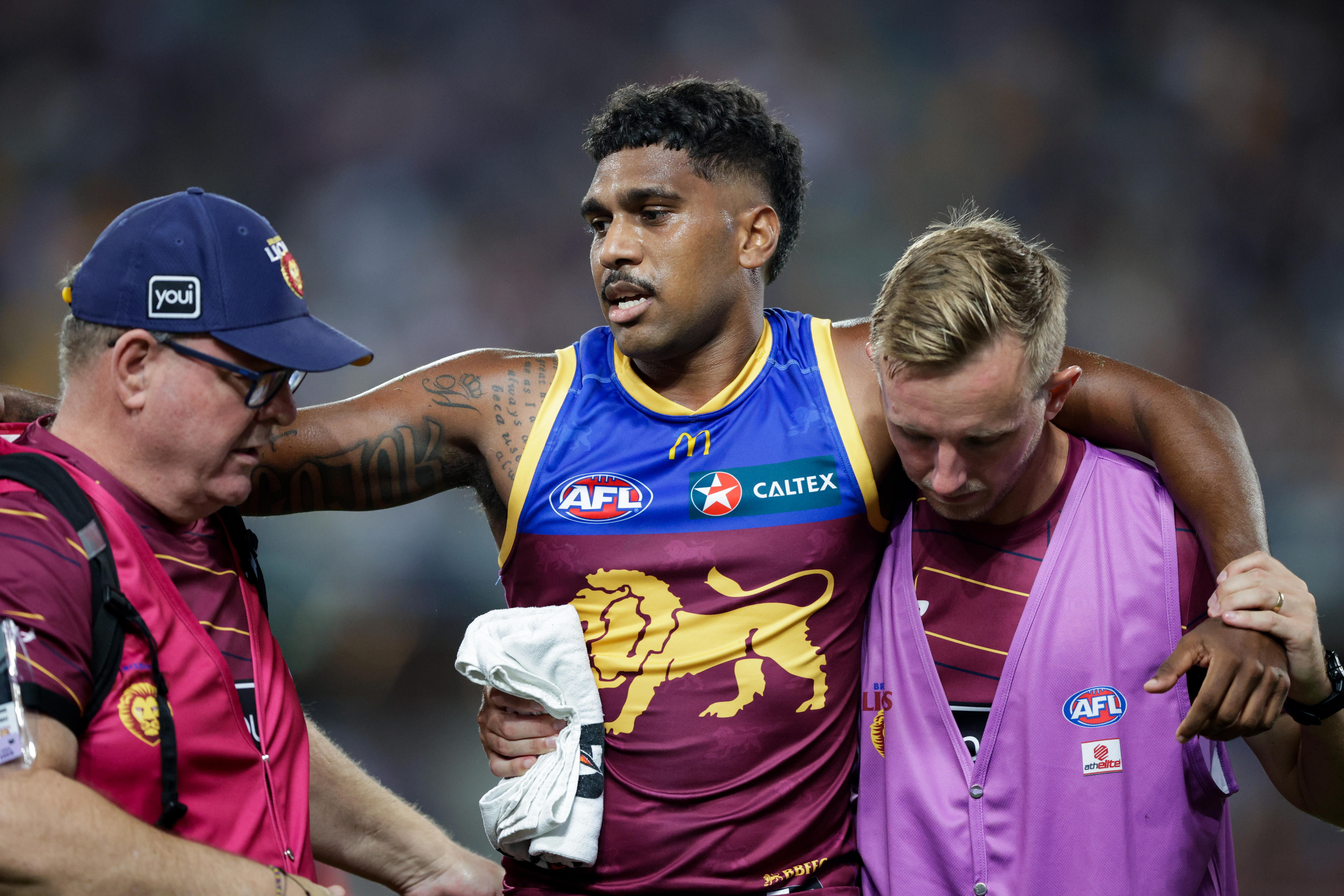 Keidean Coleman is taken from the field with a knee injury.