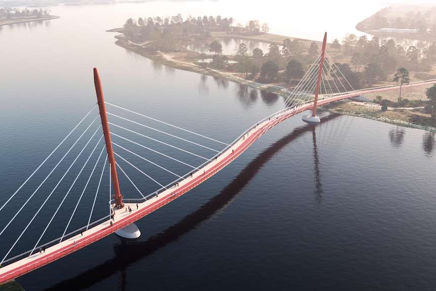 A red pedestrian bridge snakes over the swan river in daytime, aerial shot.