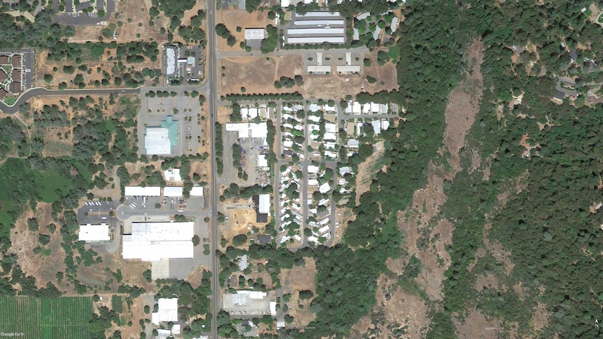 A satellite image showing the Pinecrest Mobile Home Park in Paradise surrounded by greenery and housing.