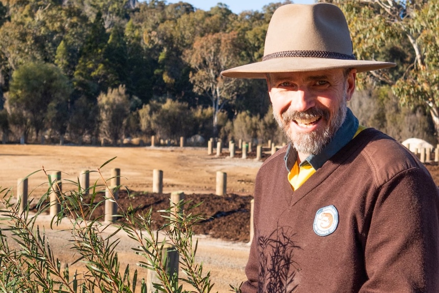 Man with beard, wearing Akubra and brown jumper