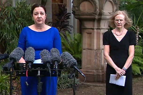 Queensland Premier Annastacia Palaszczuk speaking to the media in a garden