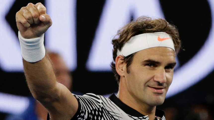 Switzerland's Roger Federer celebrates his win over Tomas Berdych in Australian Open third round.