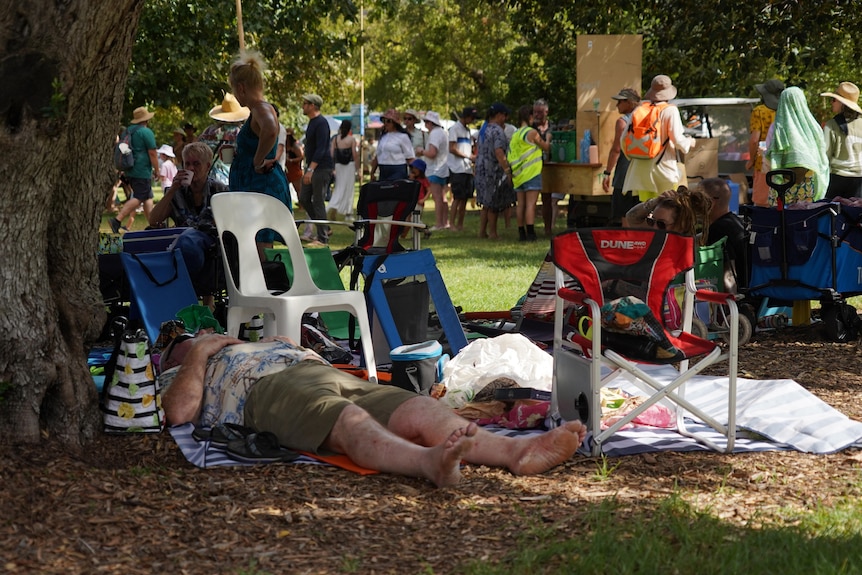 A concert-goer at the WOMADelaide music festival enjoys the shade.