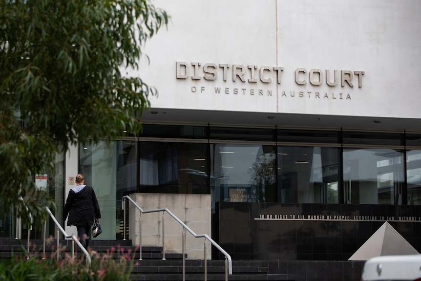 The entrance to the District Court of Western Australia, with a tree to the right of frame.
