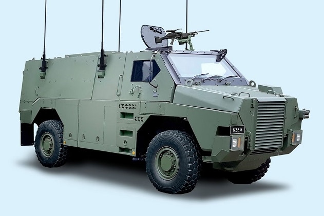 A grey armoured personnel carrier .