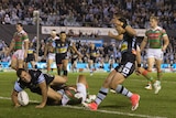Cronulla's Wade Graham (L) scores a try against South Sydney at Shark Park.
