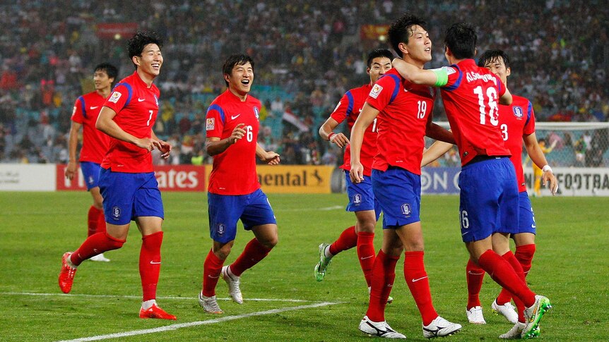 South Korea celebrates a Kim Young-gwon in the Asian Cup semi-final