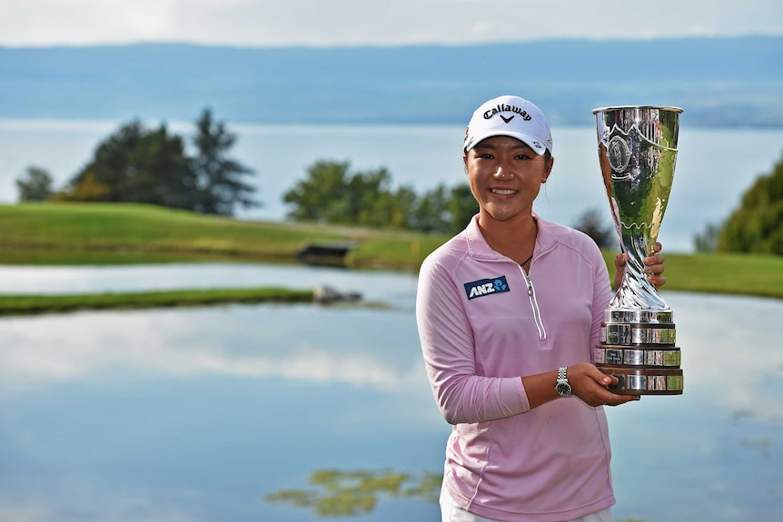 Lydia Ko with the Evian Championship trophy