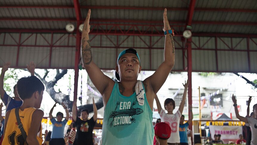 Drug addicts doing Zumba as part of a treatment plan in the Philippines.