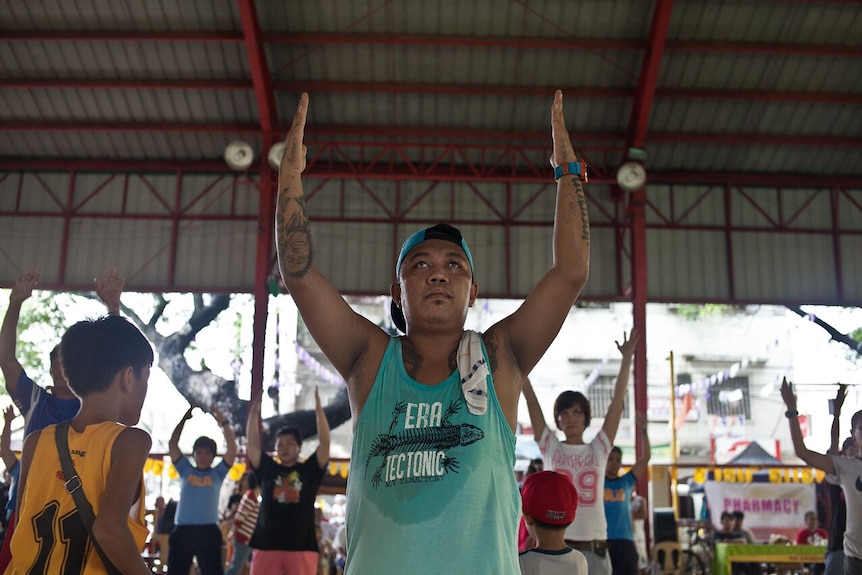 Drug addicts doing Zumba as part of a treatment plan in the Philippines.