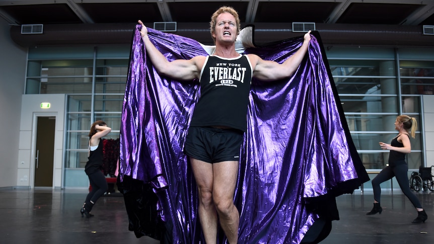 Craig McLachlan, playing the role of Frank N Furter, takes part in a rehearsal