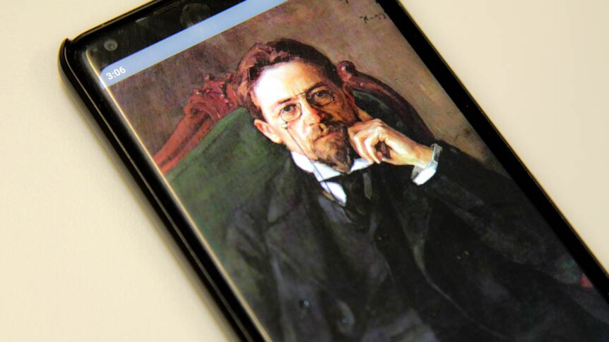 Painting of Russian playwright Anton Chekhov on a phone screen.