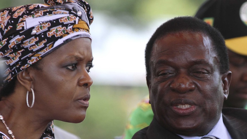 Zimbabwe's President Robert Mugabe's wife Grace talks to Vice President Emmerson Mnangagwa.