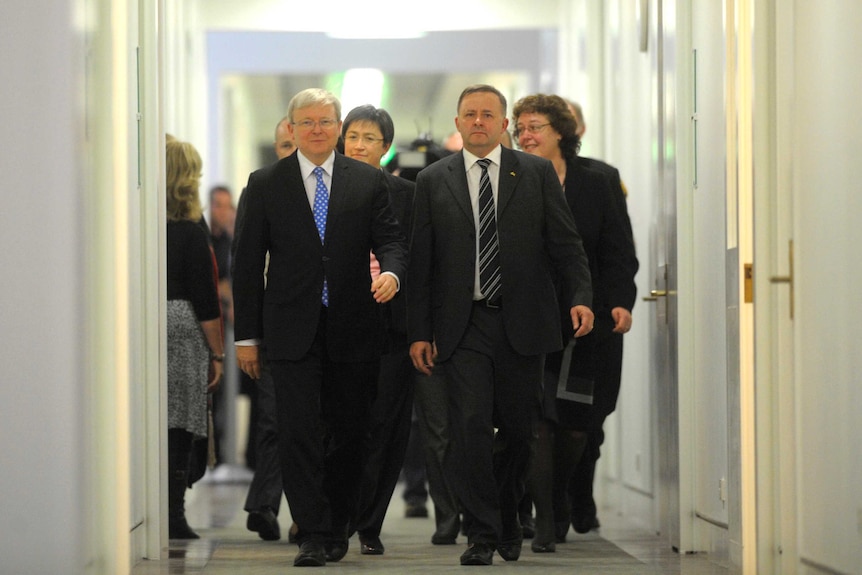 Rudd and Albanese and supporters after vote.