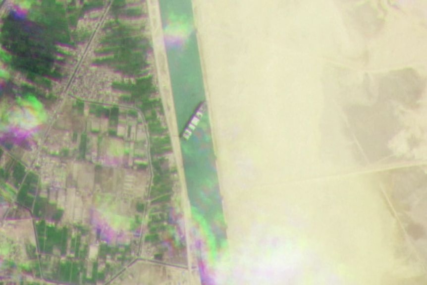 Satellite images show shipping container stranded in the Suez Canal