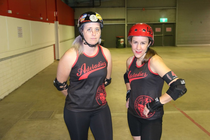 Two female roller derby competitors.