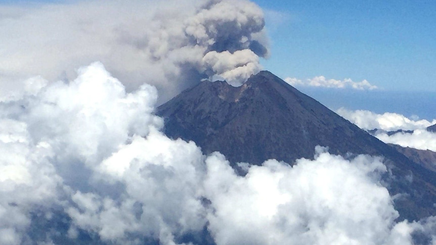 Photo taken from a plane of ash rising from Mount Barujari on Lombok Island, Indonesia.