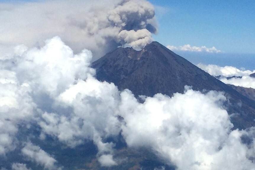 Photo taken from a plane of ash rising from Mount Barujari on Lombok Island, Indonesia.