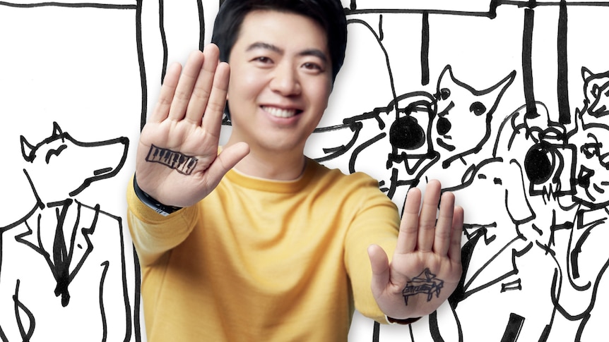 Lang Lang in front of a background of cartoon animals. His palms have with a piano keyboard drawn on one and a grand piano.