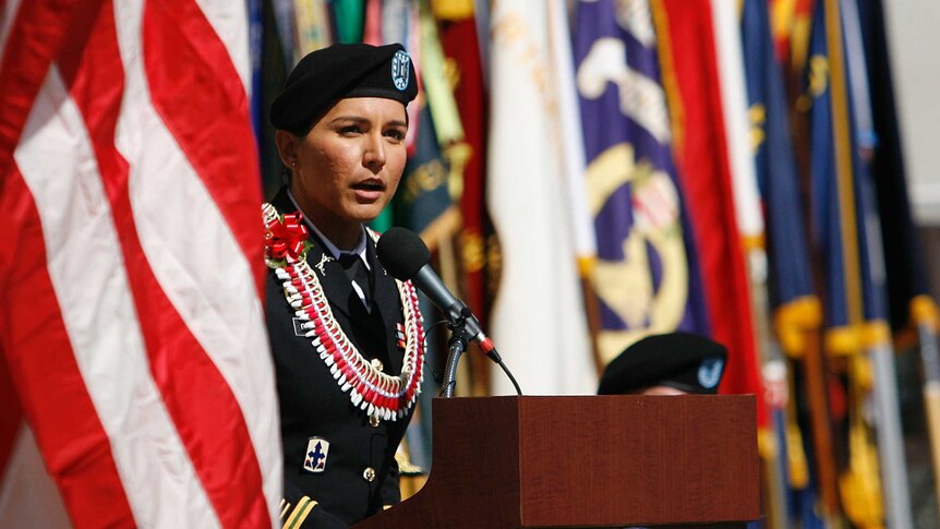 Tulsi Gabbard addresses the crowd at a Veterans Day ceremony in Honolulu