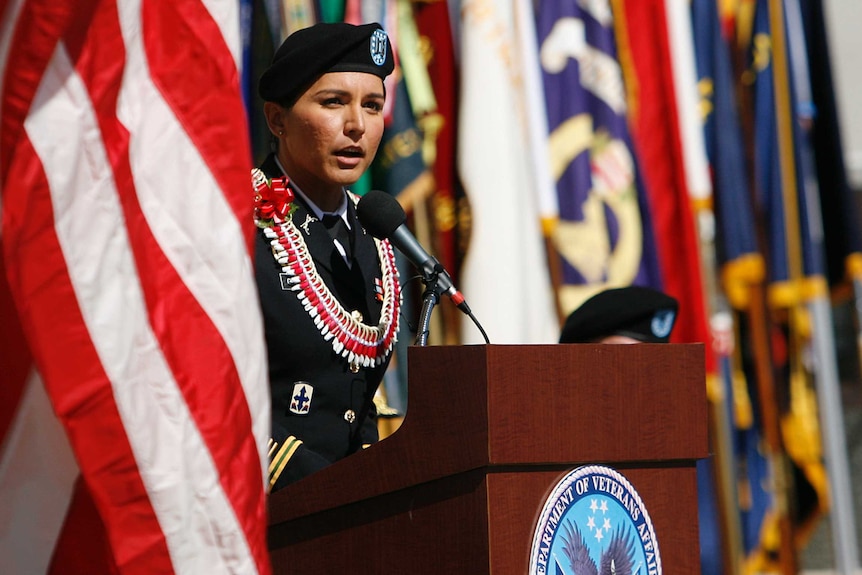 Tulsi Gabbard addresses the crowd at a Veterans Day ceremony in Honolulu