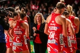Briony Akle talks in the NSW Swifts huddle