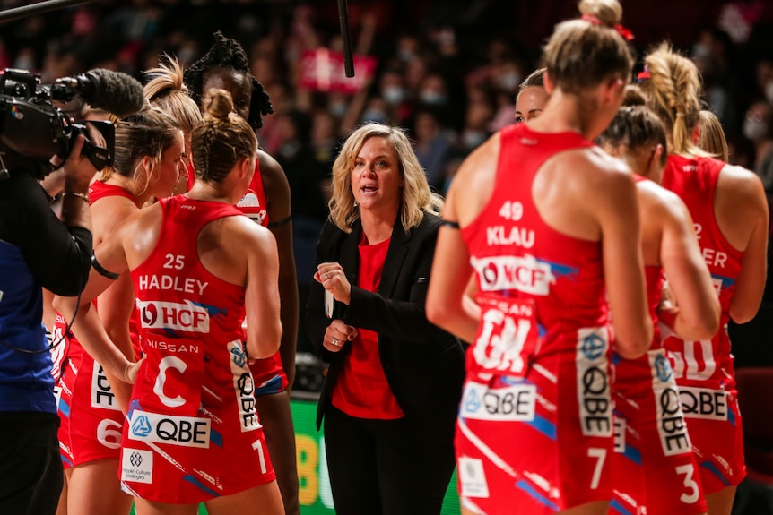 Briony Akle talks in the NSW Swifts huddle
