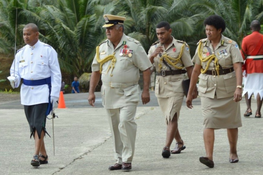 Fiji's Commissioner of Prisons, Francis Kean, inspects a guard of honour.