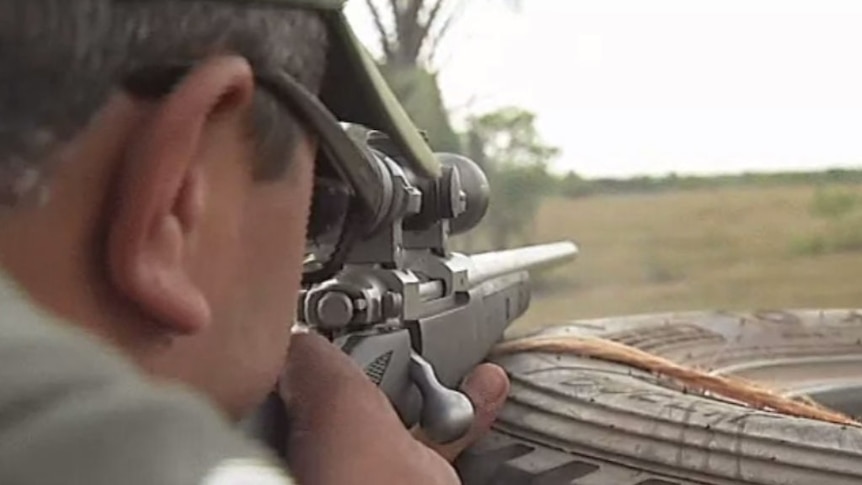 A shooter taking aim.