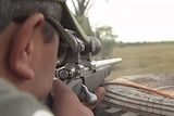A shooter taking aim.
