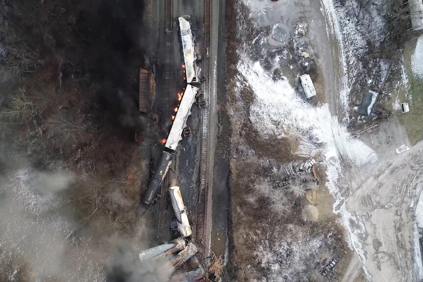 Drone footage of burning derailed trains. 