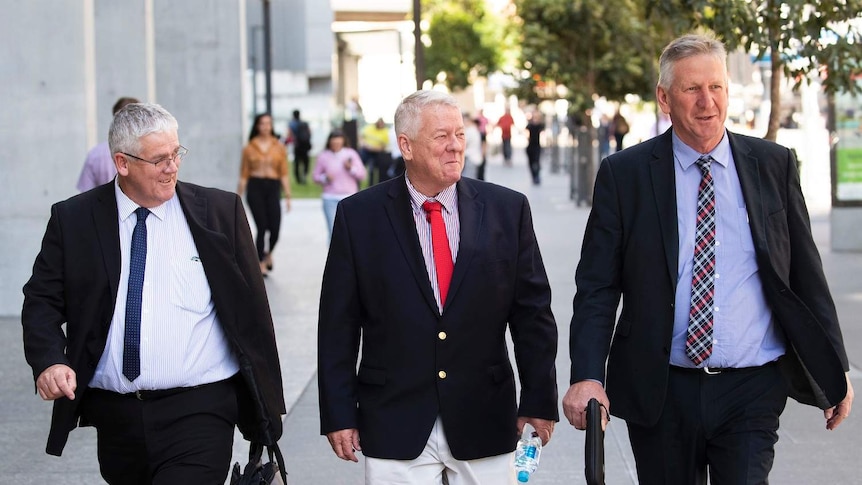 Neill, John and Denis Wagner leave the Supreme Court in Brisbane, Wednesday, September 4, 2019.