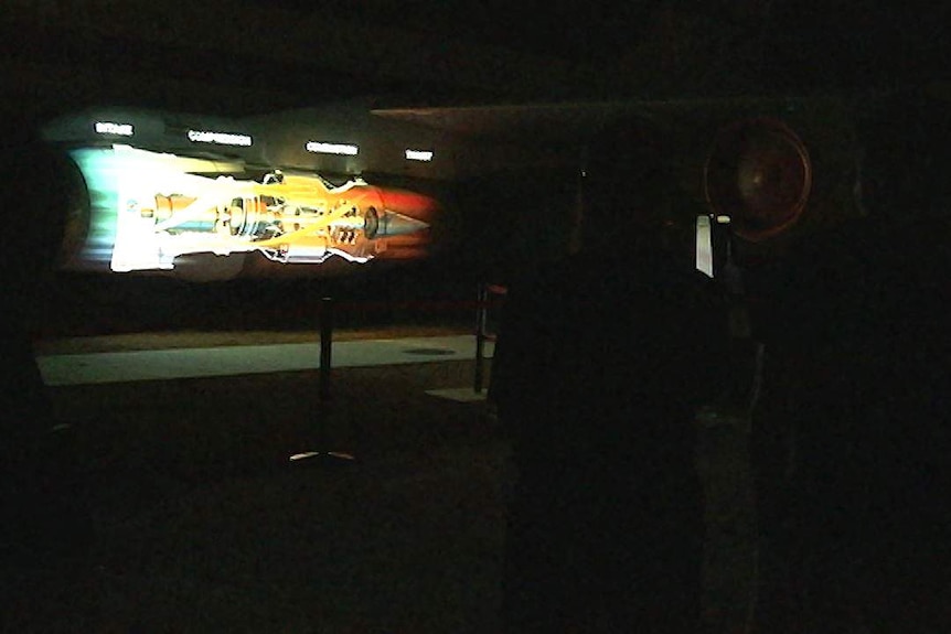 An engine is projected onto a plane at the Qantas Founders Museum in Longreach.