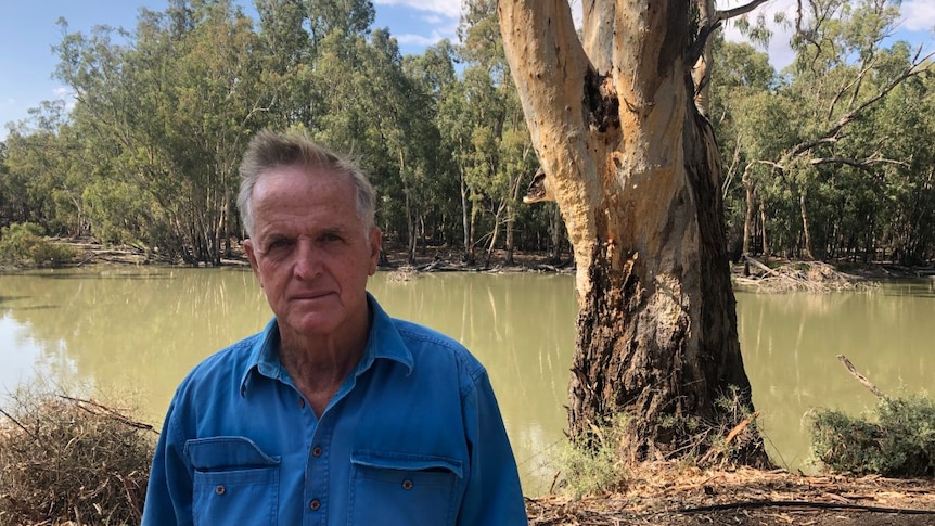 Sunrice chairman Laurie Arthur stands by on the banks of the Darling.