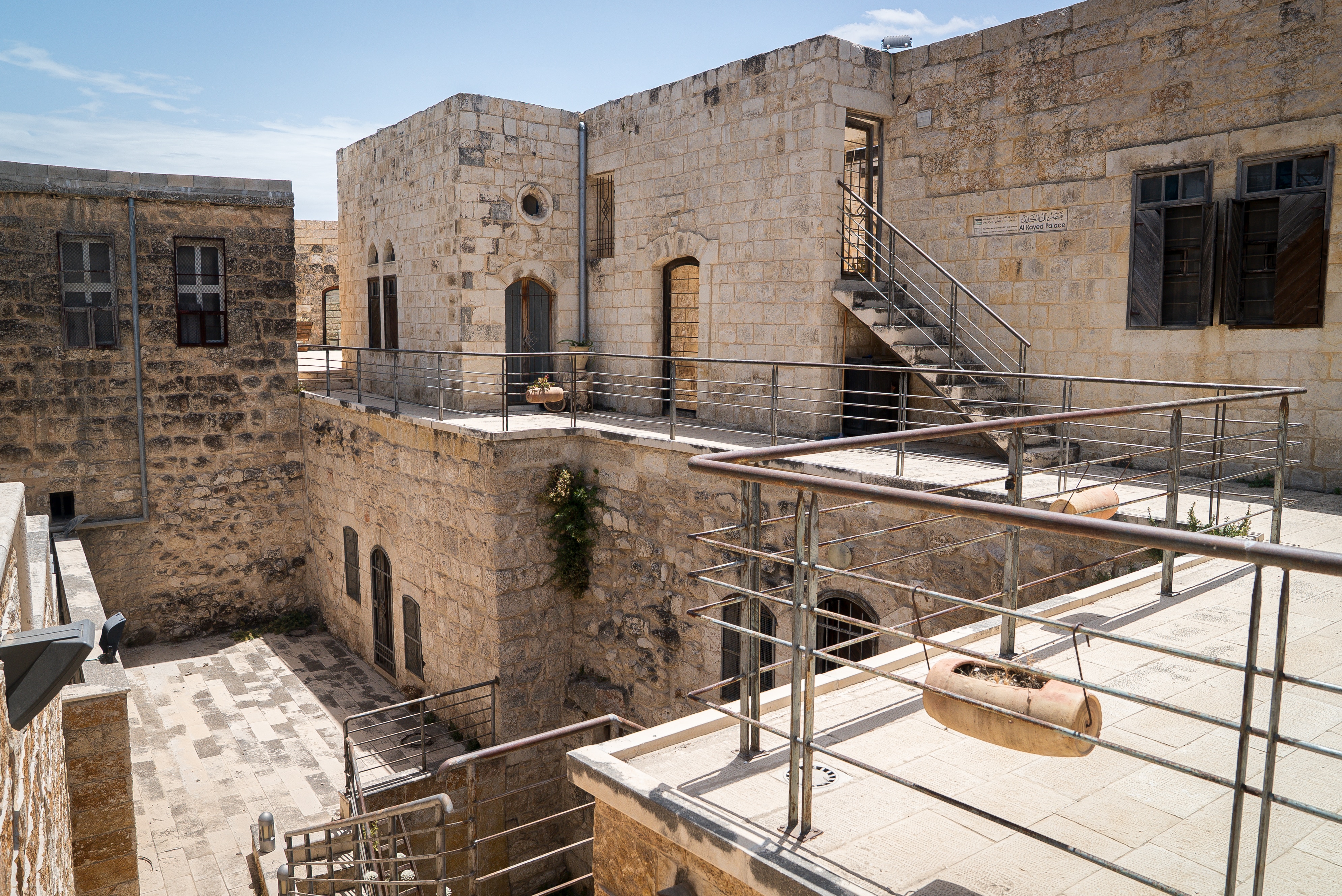 A historic site in Sebastia with handrails set up around the perimeter.