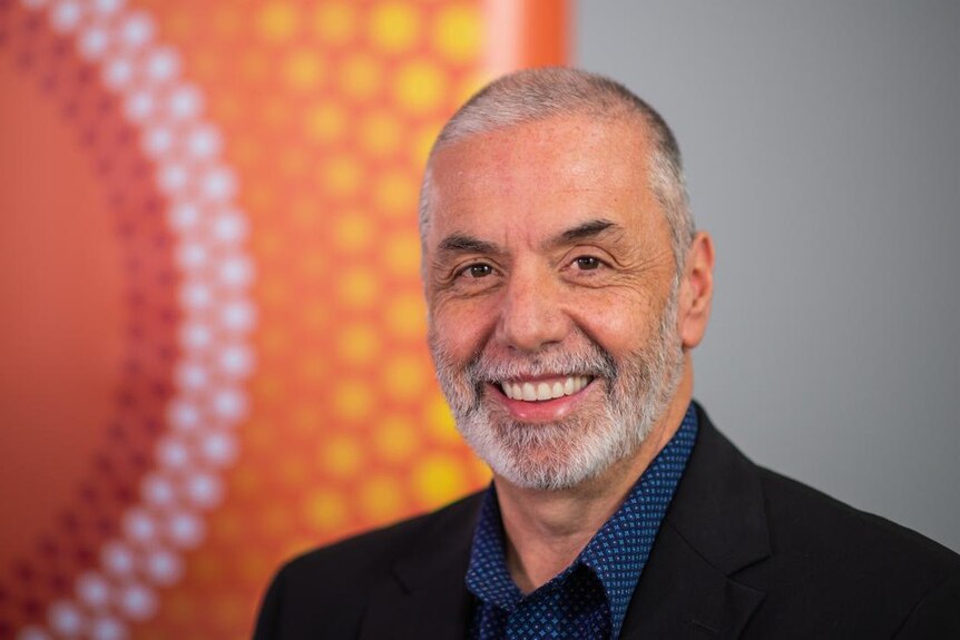 photograph of Australian Childhood Foundation CEO Joe Tucci smiling at camera